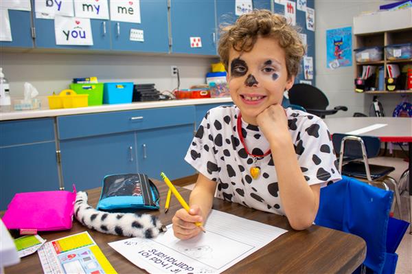 boy dressed as dalmatian dog
